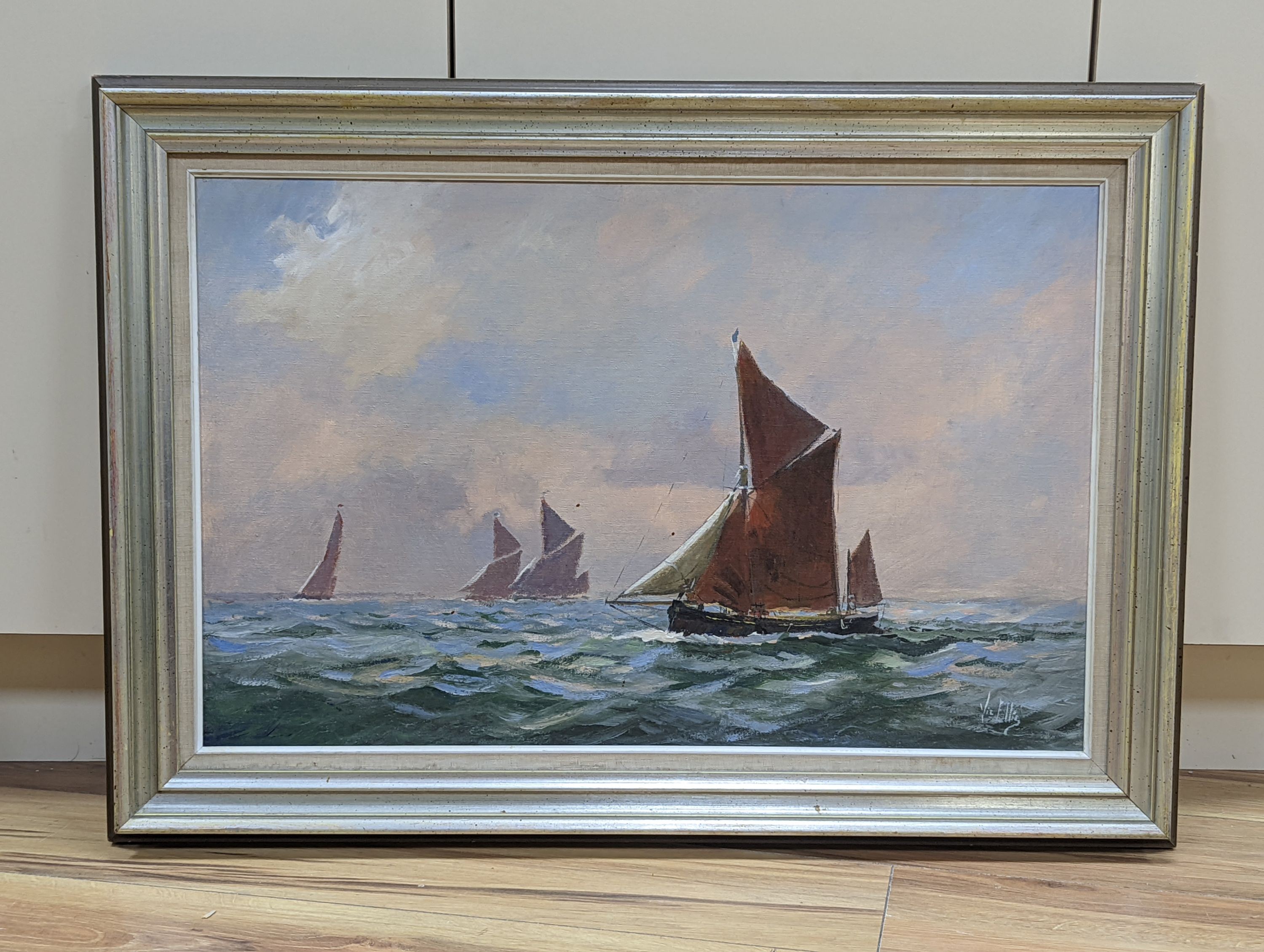Vic Ellis (1921-1984), oil on canvas board, Sail barges at sea, signed, 44 x 70cm